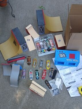 Tech Deck finger skateboard lot, includes multiple miniature boards